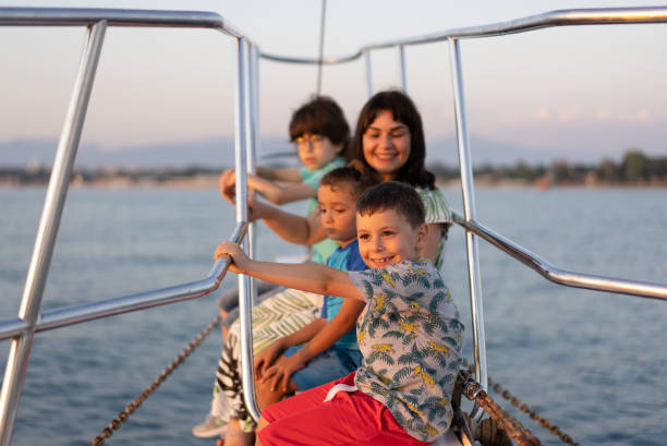 istock Family sailing on luxury yacht 1327523616