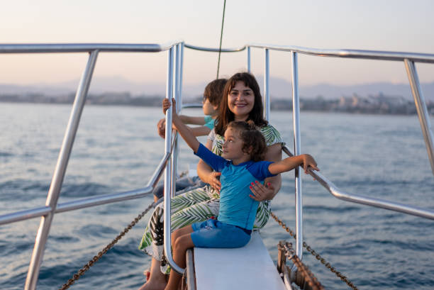 istock Family sailing on luxury yacht 1327523726