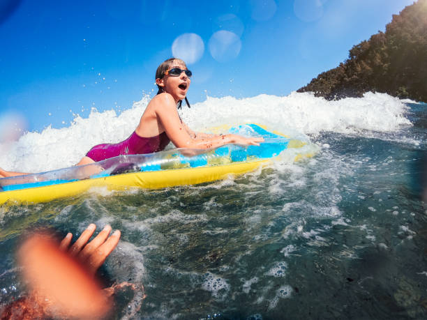 istock Girl having fun floating on the airbed 1327531660