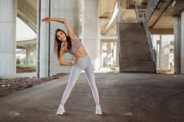 istock Young woman exercising 1327538823