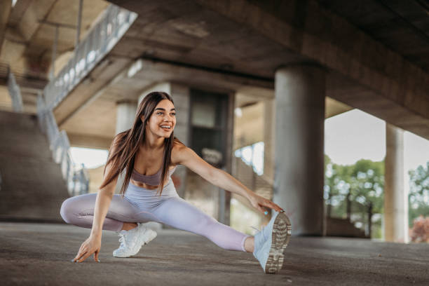 istock Young woman exercising 1327538881