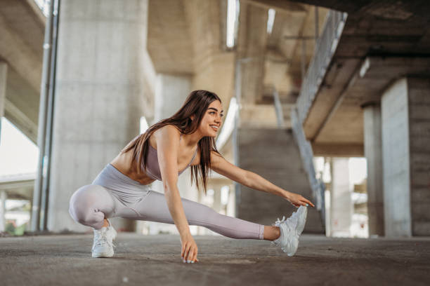 istock Young woman exercising 1327538886
