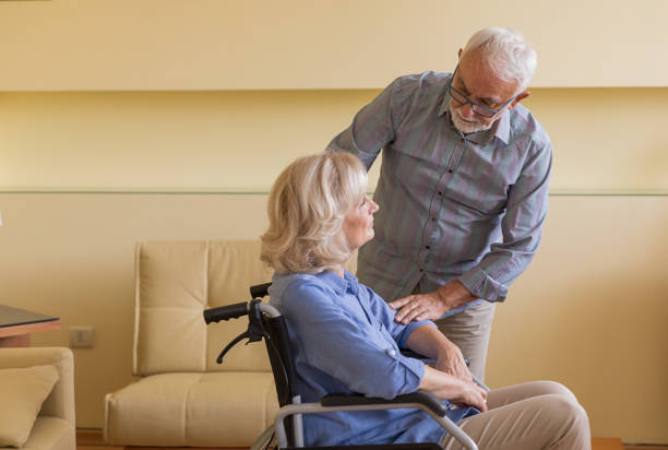 istock Disabled Woman is Enjoying the Time with her Husband While at Home. 1327539571