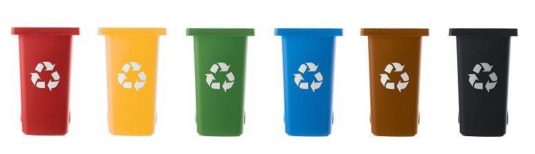 Set of plastic multicolored trash cans isolated on white background. Waste recycling and environmental protection concept.