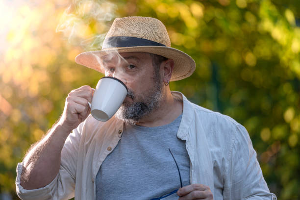 istock Senior Man Drinking a Coffee or a Tea Outdoors. 1327543064