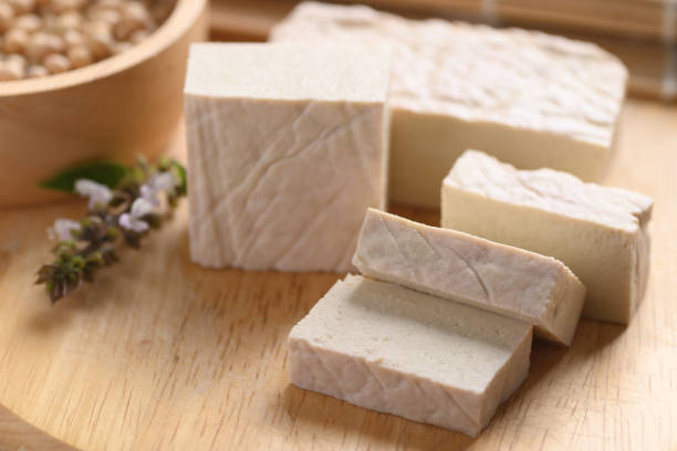 istock Fresh Tofu on wooden cutting board 1327543679