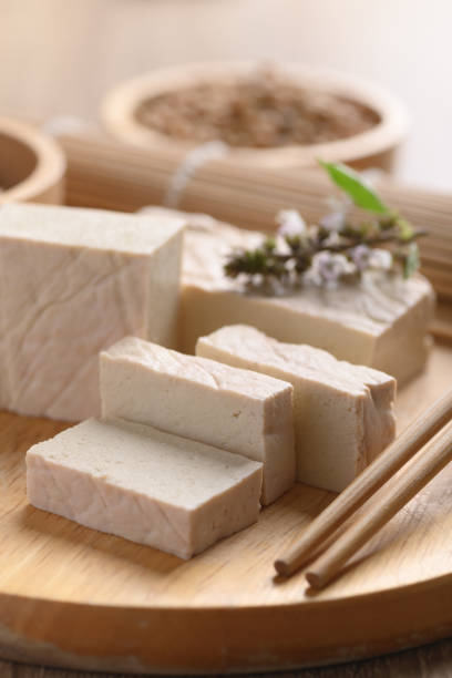 istock Fresh Tofu on wooden cutting board 1327543690
