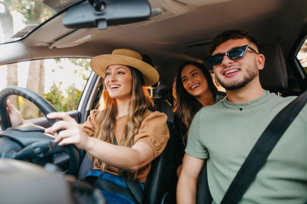 happy friends traveling by car happy friends traveling by car road trip stock pictures, royalty-free photos & images