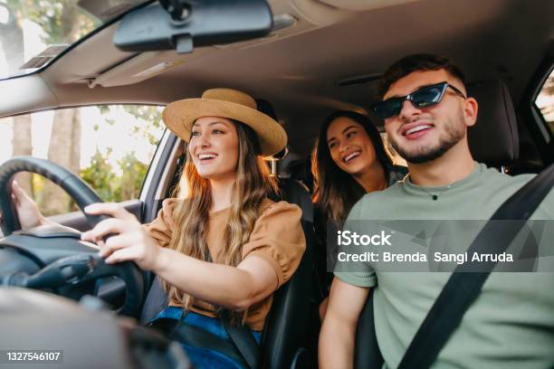 Happy Friends Traveling By Car Stock Photo - Download Image Now - Car, Friendship, Travel