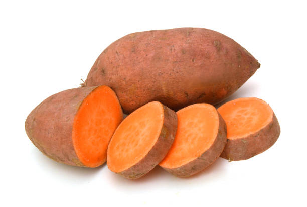 istock Sweet potatoes on white background 1327547631
