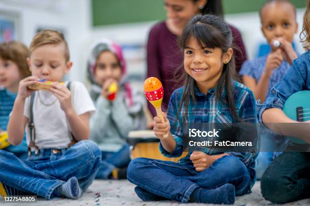 Kids Playing Music In Preschool Stock Photo - Download Image Now - Music, Learning, Maraca