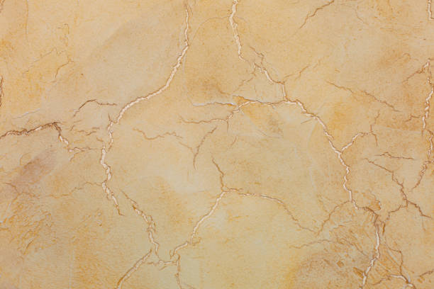istock Textured background yellow cracked plaster. 1327551166