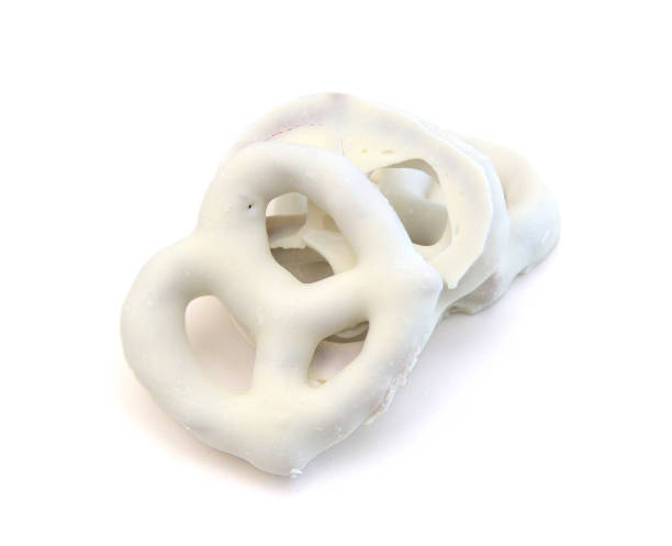 istock white chocolate covered pretzels on white background 1327551226