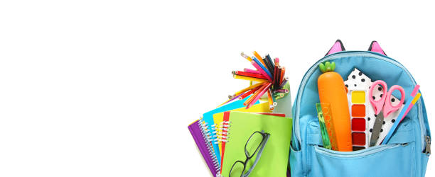 istock Colorful school supplies isolated on white background empty copy space. Back to school concept objects horizontal banner. Backpack with school accessories. 1327551304