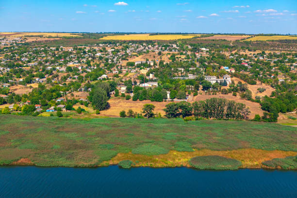 istock Awesome scenery with village situated on the river bank 1327552446