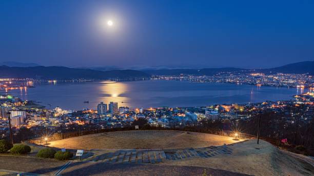 Spring night view of Lake Suwa and Suwa city from Tateishi park in Nagano prefecture, Japan This is a spring night view of Lake Suwa and Suwa city from Tateishi park in Nagano prefecture, Japan.
Suwa area is well known as the tourist destination in this prefecture, especially on summer season.
But of course, spring season is also beautiful. suwa lake photos stock pictures, royalty-free photos & images