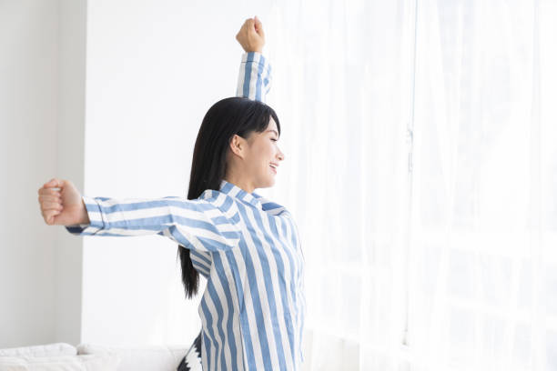 istock asian woman in night clothes 1327554312