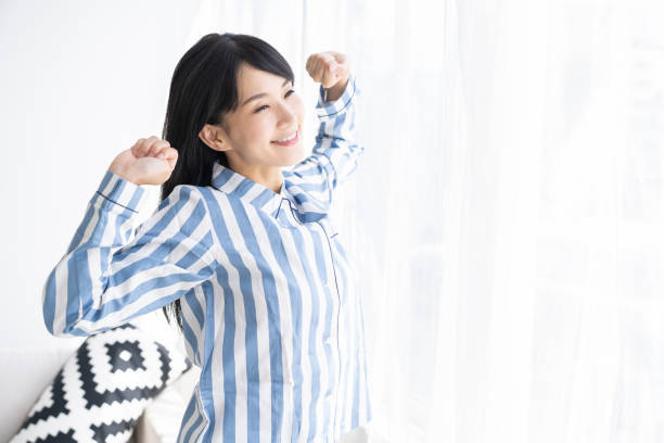 istock asian woman in night clothes 1327554339