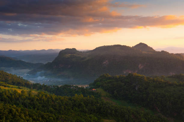 istock Mountain landscape and morning mist. 1327563302