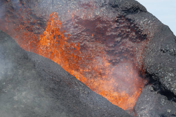 istock Magma Springing From A Volcano Crater 1327564406