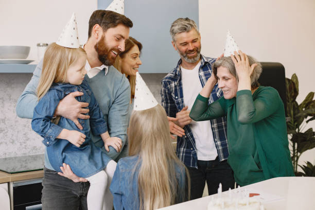 istock Family celebrating birthday in the kitchen 1327567726
