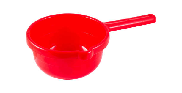 istock Red round plastic water dipper isolated on white 1327580984