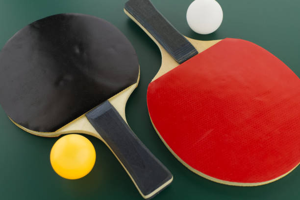 istock Two table tennis racks with ping pong ball 1327584707