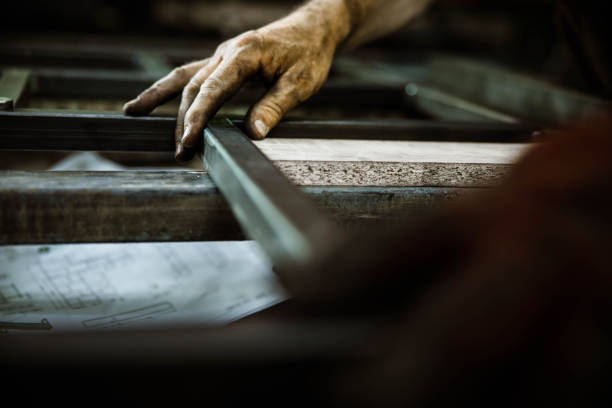 istock Close up of unrecognizable worker working with iron. 1327585673