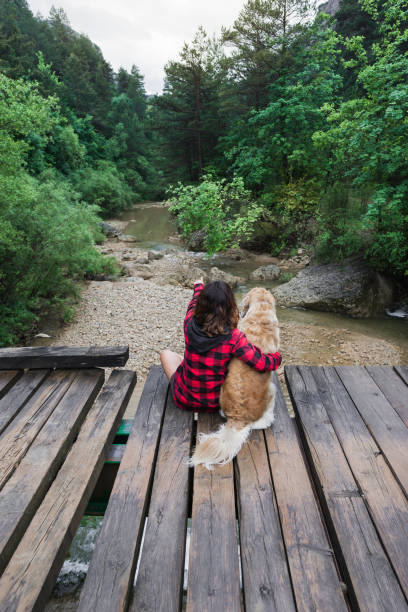 istock woman with her dog 1327590815
