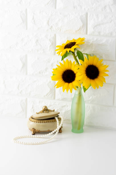 istock Background image of room with white walls and white table 1327591159