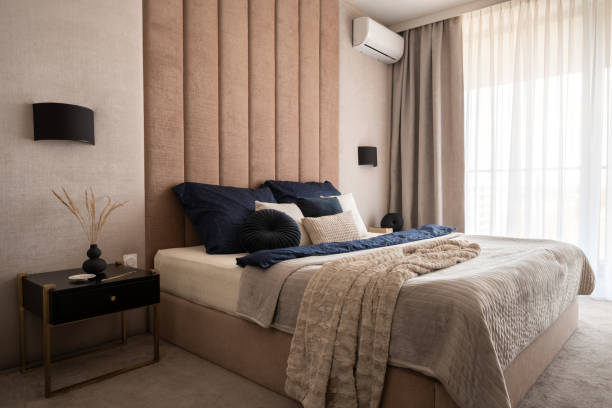 istock Fancy beige bedroom with dark details 1327592266