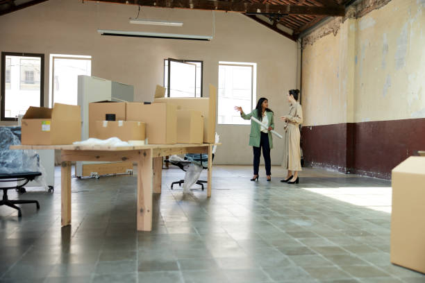 General view of an interior designer is showing new office space.