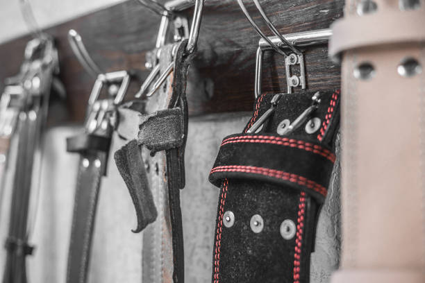 Many Belts weight lifter . close up