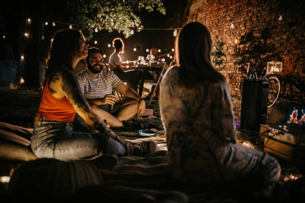 istock Friends on party in back yard 1327595837