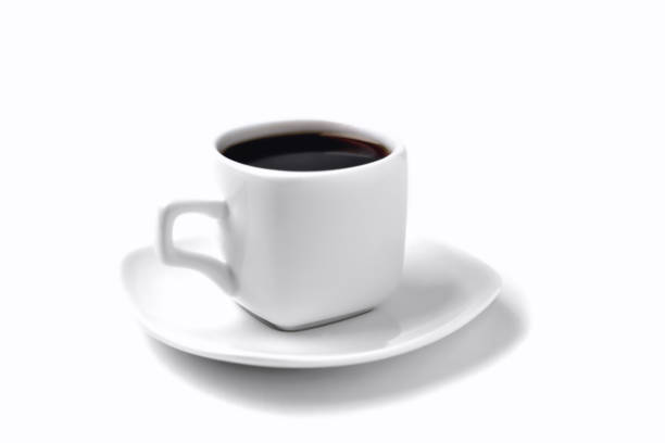 istock white cup of coffee on a white saucer; on a white background; isolate, close-up, angle view from above 1327596248