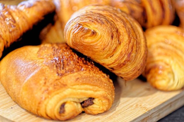 istock Fresh croissants and pain au chocolate on a plate 1327596457