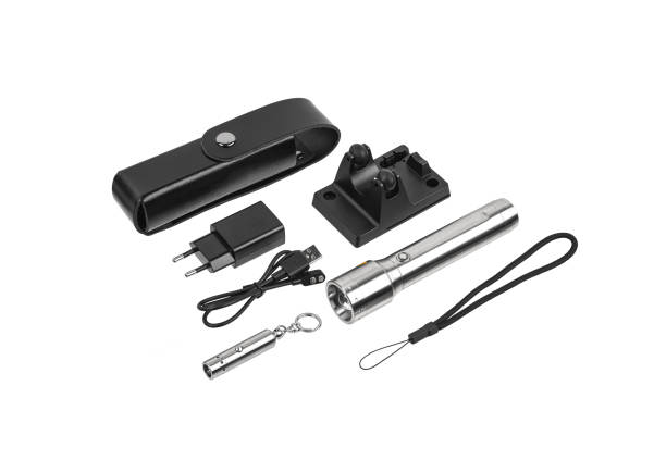 istock Modern silver metal LED flashlight. Pocket portable rechargeable lighting device. Isolate on a white background. 1327597703