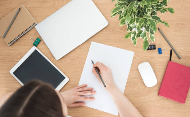 istock Young girl working at home office 1327597776