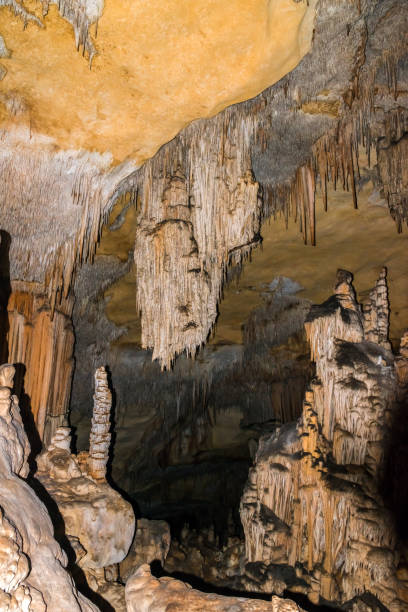 istock Dripstone cave with stalactites and stalagmites 1327601011