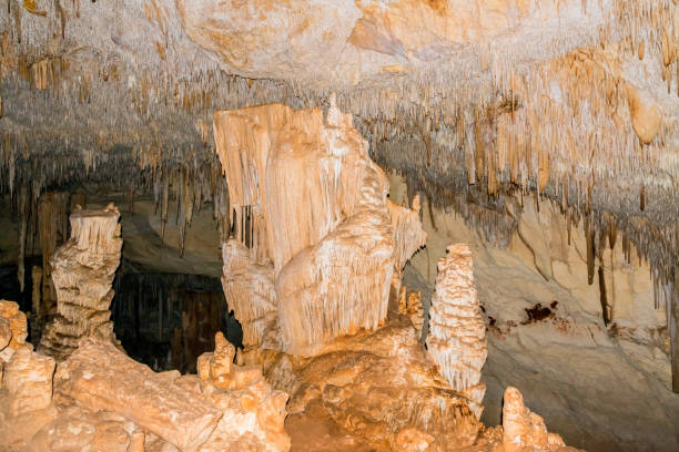 istock Dripstone cave with stalactites and stalagmites 1327601165
