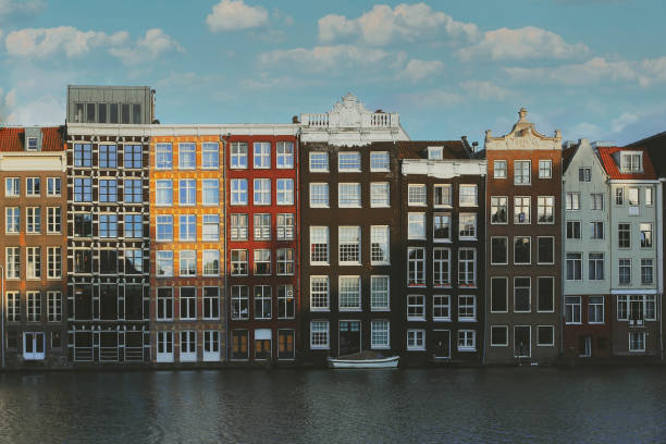 Amsterdam buildings on the water, Netherlands. Amsterdam buildings on the water, Netherlands. jordaan amsterdam stock pictures, royalty-free photos & images