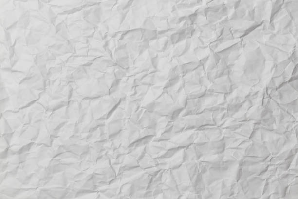 istock wrinkled white paper for background and wallpaper. 1327606354