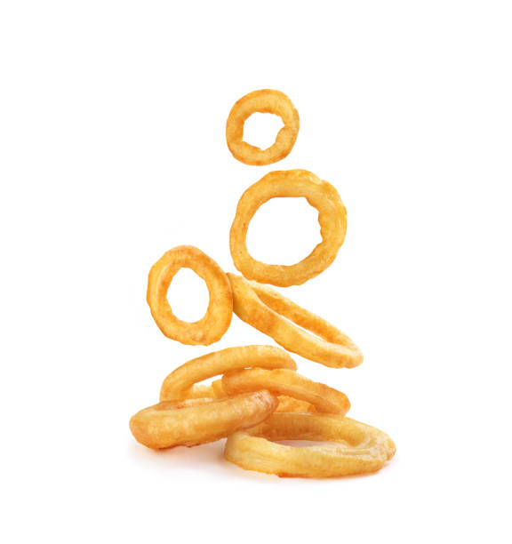 istock Onion rings in batter in flight on a white background 1327606450