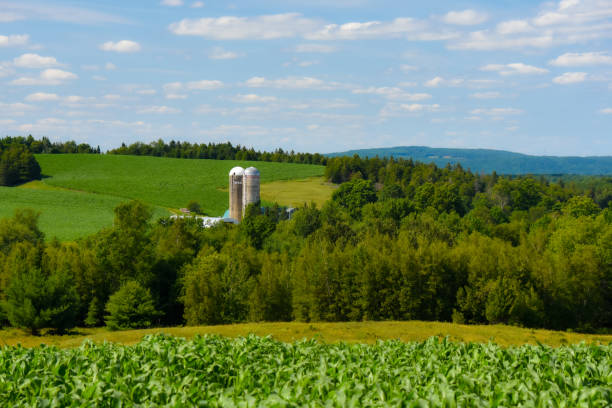 istock Countryside landscape with farm 1327609658
