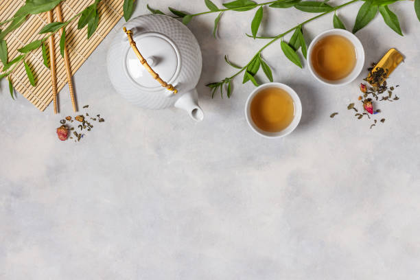 istock Tea ceremony with teapot and tea cups top view with copy space. 1327611451