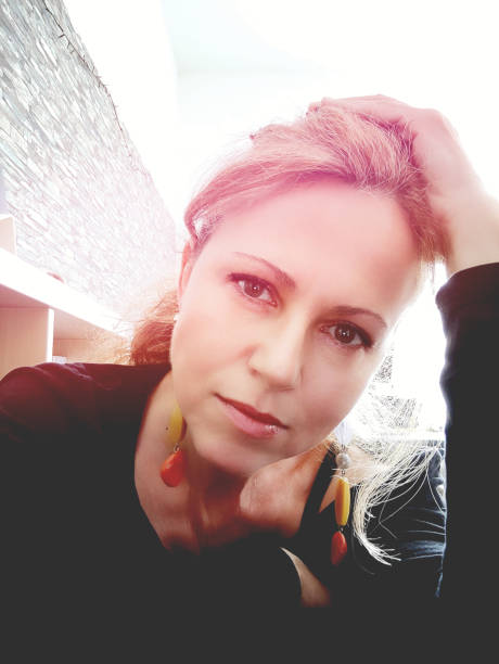 istock Close-up sad  Woman Leaning Head on Hand 1327613319