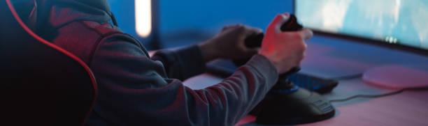 istock The gamer playing online video game on his personal computer 1327613514