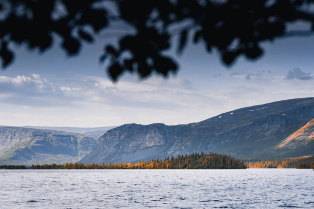 istock Bright sunny day on the northern lake 1327614209