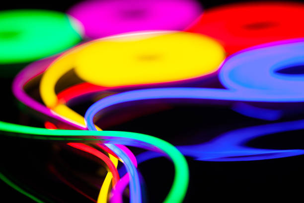 Flexible led tape neon flex in different colors on black background