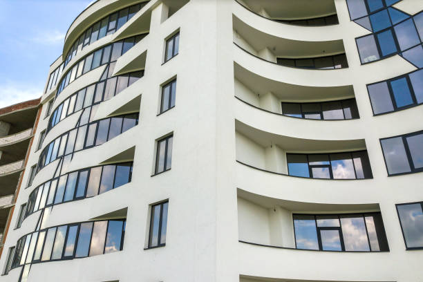 istock Many windows on new apartment building facade. 1327617955